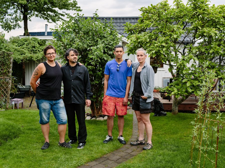 Sweden. Married couple Gabriella and Candel Webster host Syrian Ahmad Lababidi, his son, Ali, 18 and daughter, Hiba (16) who is not pictured, in Malmö. 