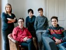 Sabine Waldner with her daughters, Charlotte and Miriam, host two Syrian refugees, Juan (16) and Mohammed (16), classmates from Damascus, at their home in Falkensee, Germany. This portrait is part of the No Stranger Place series, which portrays locals and
