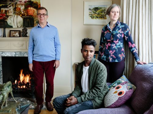 United Kingdom. Charles Elliott, 61, and wife Catharine, 55, have are hosting Hussein, 20, a refugee from Ethiopia in London. Photo: Aubrey Wade / UNHCR
